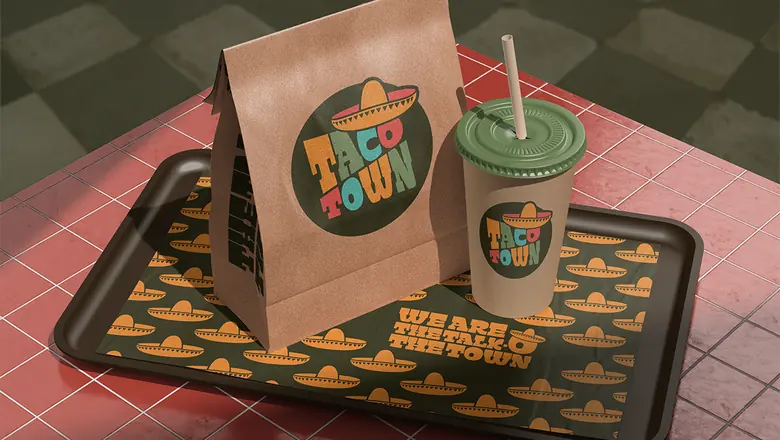 Taco Town branded packaging on a fast food tray